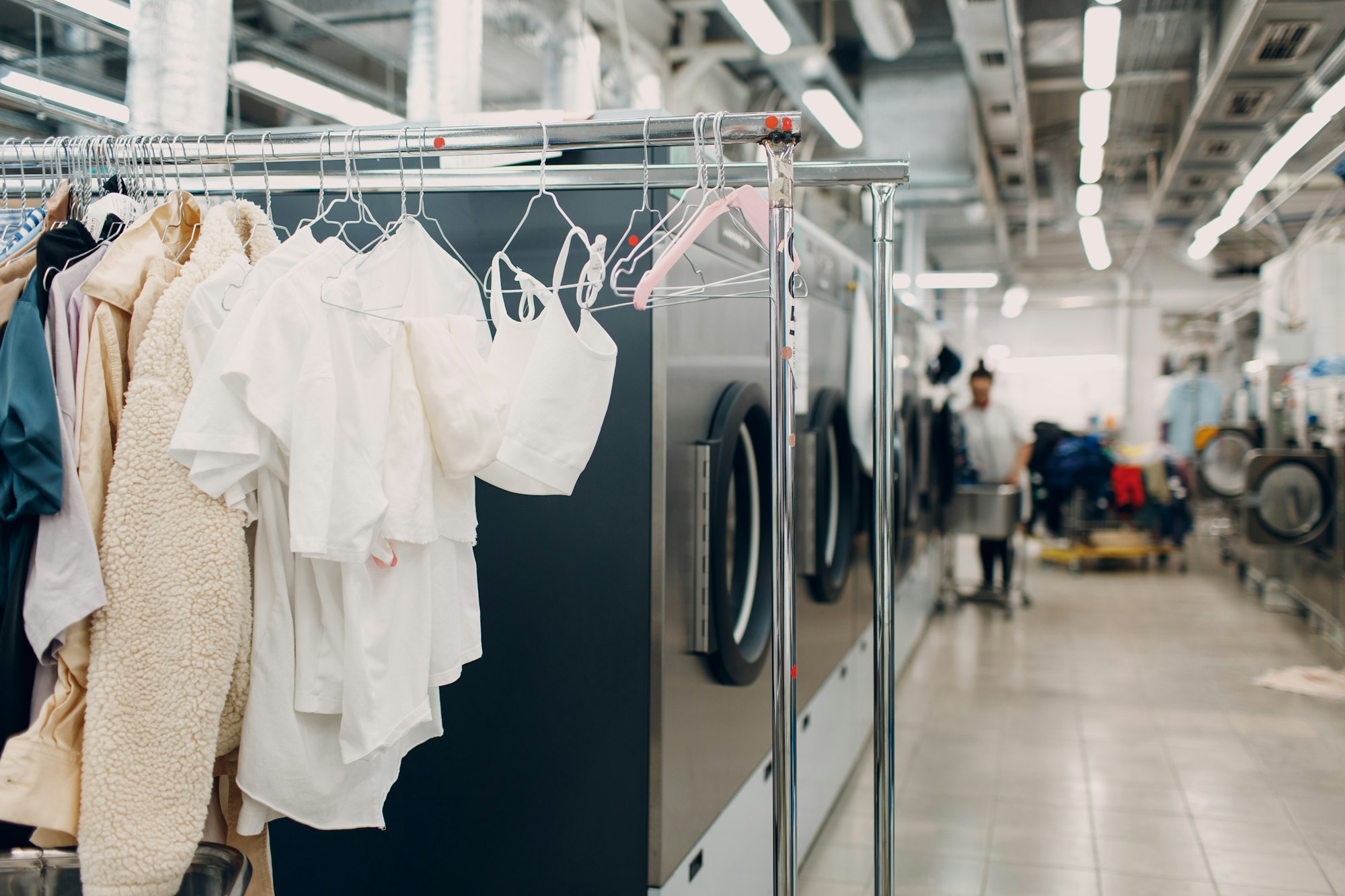 Dry cleaning clothes. Clean cloth chemical process. Laundry industrial dry-cleaning